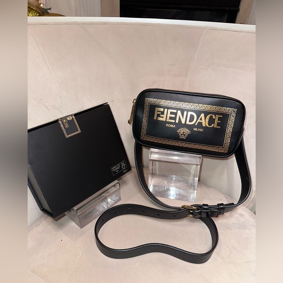 Fendi Handbags - Authentic FENDACE Camera Crossbody
Fendi x Versace Collaboration | Black & Gold